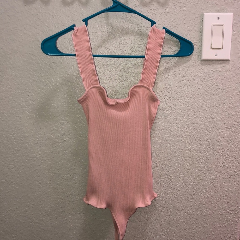 A pretty light pink one piece